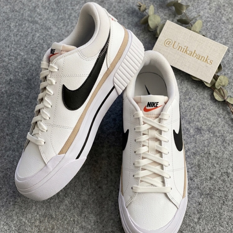 Nike White Sneakers With Black Swoosh And Beige Trim